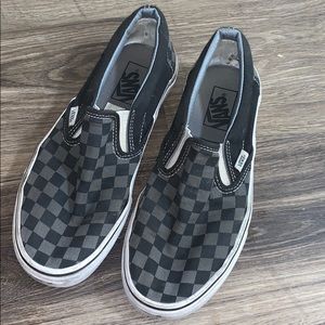 Gray and black checkered vans
